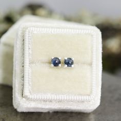 These lovely gemstone stud earrings feature two rose cut 4mm blue sapphires in sterling silver prong settings. The natural sapphire stones are a gorgeous dark blue color. The pair you see in the photos has sold but your pair will be just as lovely. This sapphire, from Thailand, is a very dark blue. Please note that these photos were taken under very bright daylight bulbs and that the stones look darker under natural light. Sapphire is September's birthstone, and is also considered a traditional Sapphire Gemstones In Sterling Silver, Sapphire Gemstones For Gifts, Sapphire Hypoallergenic Jewelry For Anniversary, Hypoallergenic Sapphire Jewelry For Anniversary, Sapphire Gemstones Fine Jewelry Gift, Sapphire Faceted Jewelry For Anniversary, Sapphire Gemstones As Gift, Faceted Sapphire Jewelry For Anniversary, Sapphire Gemstone Earrings As Gift