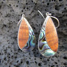 Koa Wood Teardrop Earrings w/Paua Shell 32x15mm International customers please keep in mind that you might need to pay customs fee upon receiving item depending on your country regulations. Gift velvet drawstring pouch baggie included with each order. To better understand the size of item please look thru images, each of listings contains item next to a dime coin, which is 0.7 inch in diameter. Pieces with Abalone (Paua) Shells have unique patterns and colors. Every single one is unique. Colors Dangle Inlay Earrings For Gifts, Dangle Earrings With Inlay For Gift, Inlay Dangle Earrings For Gift, Gift Dangle Earrings With Inlay, Teardrop Inlay Earrings For Gift, Teardrop Inlay Earrings As Gift, Unique Teardrop Earrings, Unique Hypoallergenic Teardrop Earrings, Wood Teardrop Earrings