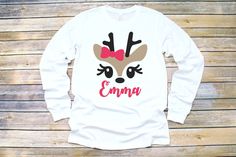 "This is the perfect Christmas shirt for your little one to wear on Christmas! Super cute reindeer outfit , this would make the perfect gift for a boy or girl This shirt comes personalized with name . Please let me know the size, name during check out. We press our shirts with a professional heat press, use high quality transfer paper and ink and use a small business printer. We use infant bodysuits (one pieces) , sizes 0-3 months, 3-6 months, 6-12 months and 12-18 months. Infant lap tees sizes Christmas Gifts Baby Girl, Christmas Gift For Baby, Reindeer Outfit, Girls Christmas Shirts, Personalized Christmas Shirts, Christmas Gift Baby, Toddler Christmas Outfit, Deer Shirt, Boys Christmas Outfits