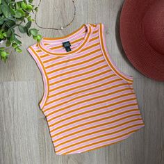 Bright Orange/Pink Tank Top In A Size Xs. Stripped All Around With Stretchy Material. Never Worn, New Without Tag. Casual Striped Sleeveless Crop Top, Casual Sleeveless Striped Crop Top, Casual Pink Crop Top For Summer, Striped Summer Tank Top, Pink Casual Tank Top For Spring, Striped Sleeveless Crop Top For Day Out, Casual Pink Tank Top For Spring, Casual Pink Crop Top For Day Out, Trendy Striped Tank Top For Spring