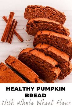 healthy pumpkin bread with whole wheat flour and cinnamon sticks on the side, in front of it