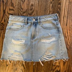 Perfect Condition! Never Worn, No Flaws Pacsun Blue Jean Denim Skirt. Size 24 Summer Cutoff Light Wash Skirt, Light Wash Cutoff Skirt For Summer, Casual Ripped Light Wash Skirt, Casual Light Wash Ripped Skirt, Summer Light Wash Cutoff Skirt, Blue Ripped Skirt For Summer, Distressed Blue Denim Skirt For Summer, Blue Distressed Denim Skirt For Summer, Casual Light Wash Cutoff Skirt