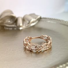 a gold ring sitting on top of a table