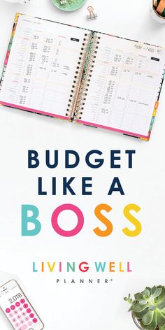 a book with the title budget like a boss living well planner on top of it