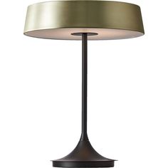 a table lamp with a beige shade on it's base and a white background