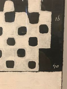 a black and white painting with numbers on it