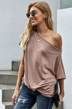 Off-The-Shoulder Slash Neck Loose Fitting Tops $23 S, M , L, XL, 2X Black or Apricot The fabric is very stretchy, which makes it light and ideal for summer weather. This short sleeve blouse is chic delightful and loose enough but not baggy. The side twist knot adds the final touch to this trendy look! Flattering on all body shapes! Pairs well with leggings and jeans. Fabric95%Polyester+5%Spandex Blouse Sale, One Shoulder Top, Loose Fitting Tops, Scoop Neck Top, Jeans Size Chart, One Shoulder Tops, Popular Style, Short Sleeve Blouse, Fashion Tops