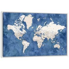 a blue and white world map is shown on the wall in front of a wooden frame