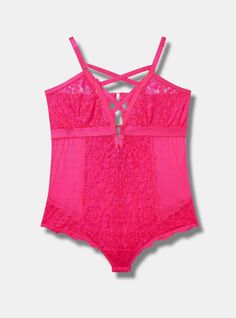 FIT Wireless cups. Bodysuit silhouette. Adjustable straps. . MATERIALS + CARE Lace knit fabric. . 87% nylon, 13% elastane. Machine wash cold. Line dry. Imported. DETAILS Floral lace throughout. . Strappy detail. The best plus size women's floral lace strappy bodysuit bodysuits in pink glo made of lace. Torrid is your destination for the freshest spring and summer styles. Torrid Lingerie, Full Figure Lingerie, Under Bust Corset, Strappy Bodysuit, Floral Lace Shorts, Oversized Sweater Cardigan, Strappy Bralette, Lace Bustier, Cozy Pullover