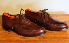 This is a very nice pair of split-toe Norwegian Bluchers from Nunn-Bush (pic.6) ca. 1960's labeled PLI-FLEX CUSHION SOFT (pic.10.) They have a glossy finish, with a pebble grained calfskin in a walnut brown with a hint of red. These have only been worn a few times and retain much of the original sole finish (pic.7) and obviously have negligible heel wear. They have pebble grained leather uppers, and a four eyelet vamp with backing grommets. There is fine stitch work throughout and Goodyear welte Fitted Vintage Oxfords For Derby, Vintage Fitted Oxfords With Leather Sole, Vintage Fitted Oxfords For Business, Retro Fitted Oxfords With Leather Sole, Vintage Brown Oxfords With Goodyear Welt, Vintage Brown Goodyear Welted Oxfords, Vintage Goodyear Welted Oxfords, Vintage Oxfords For Workwear, Vintage Fitted Oxfords For Workwear