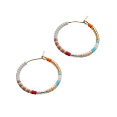 Playful + colorful beaded hoops. Available in 2 endlessly wearable sizes. From spring to fall color vibes. Small hoop 1" in diameter, Large hoop 2". Glass beads, gold-plate Made by artisans in Guatemala Multicolor Small Hoop Jewelry For Spring, Nickel Free Hoop Beaded Earrings For Everyday, Adjustable Hoop Earrings With Colorful Beads, Hoop Jewelry For Everyday Spring Wear, Bohemian Small Hoop Earrings For Spring, Spring Hoop Jewelry For Everyday Wear, Spring Hoop Jewelry For Everyday, Everyday Colorful Beads Hoop Earrings, Everyday Small Hoop Beaded Earrings With Colorful Beads