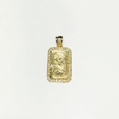 A handcrafted gold bar pendant featuring Lady Fortuna's profile bordered by shimmering white diamonds. Precious Metal: 14 Karat Yellow Gold Gemstone: White Diamonds Round Brilliant Cut: (Approx. 1.30 Cts.) Height: 46 mm Width: 23 mm Available Weight: ~16.6 grams* To check availability in other sizes and designs please inquire via e-mail or Instagram DM if necessary. *All weights are approximate. **Necklace sold separately. Please contact us if you have further questions about alternate sizes or Yellow Gold Costume Jewelry Pendant, Lady Fortuna, Goddess Fortuna, Luxury Gold-tone Necklace With Coin Pendant, Luxury Yellow Gold Pendant Gemstones, Gold Bar Pendant, Diamond Bar, Popular Jewelry, Bar Pendant