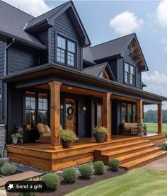 a large black house with lots of windows