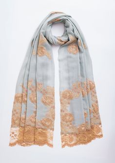 Woven from a fine cashmere, this azure scarf features an exotic dual shade beige - copper chantilly lace application extending at the ends of the scarf. A unique and stunning evening wear accessory to elevate the look of any outfit. Elegant Formal Dupatta With Lace Work, Elegant Sheer Dupatta Shawl For Festive Occasions, Elegant Silk Shawl Scarf For Festive Occasions, Elegant Festive Pashmina Shawl, Festive Elegant Pashmina Silk Scarf, Elegant Festive Silk Shawl Scarf, Elegant Festive Pashmina Silk Scarf, Elegant Silk Shawl For Festive Occasions, Elegant Festive Silk Shawl