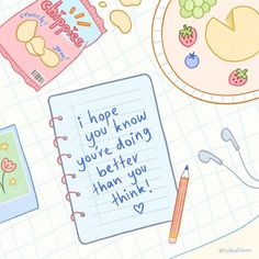 a notepad with writing on it next to some fruit and other things that are in front of it