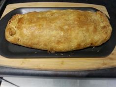 a loaf of bread sitting on top of a pan