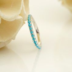 Turquoise Eternity Ring, Turquoise Wedding Ring, Dainty Ring, Turquoise Jewelry, Dainty Ring, Stacking Ring, Everyday Ring, Gift For Love Main Stone: Turquoise  Main Stone Color: Blue Main Stone Shape: Round Birth Month: December Jewelry Type: Designer Ring Metal: 925 Sterling Silver Method: Handmade Personalization: Possible Occasion: Engagement Style: Art Deco Ring Size: We make rings from US 3 to US 10. (If you need a smaller or bigger ring size, please ask me to resize) Country of Manufactur Turquoise Round Band Ring For Anniversary, Sterling Silver Stackable Turquoise Ring For Wedding, Wedding Stackable Turquoise Ring In Sterling Silver, Stackable Sterling Silver Turquoise Ring For Wedding, Stackable Turquoise Rings For Wedding, Stackable Turquoise Wedding Rings, Turquoise Stackable Rings For Wedding, Elegant Turquoise Sterling Silver Stackable Rings, Turquoise Ring For Wedding