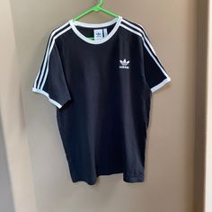 This Men’s Adidas Shirt Is In Excellent Condition. Never Worn Once, Dry Cleaned After. Size Xl. Basic Crew Neck T-shirt With Three Stripes, Graphic T Shirts Men, Classic Streetwear Tops With Three Stripes Branding, Classic Tops With Three Stripes Branding For Streetwear, Classic Three Stripes Tops For Streetwear, Adidas Cotton T-shirt With Crew Neck, Classic Adidas Short Sleeve Tops, Cotton T-shirt With Three Stripes, Casual Adidas Cotton T-shirt