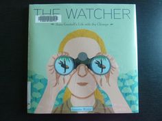 a book with an image of a woman looking through the binoculars on top of her head