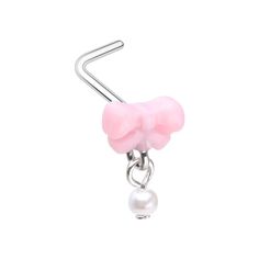 a pink and white object hanging from a metal hook with a pearl bead on it