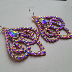 You buy earrings only. If you want to buy a necklace, please go to another catalog. New collection of earrings! High quality of material, very shiny glass crystals, hold tight to your ears while dancing! Earrings catalog https://etsy.me/3IE3rZJ Necklace catalog https://etsy.me/3YM2jZO My profile on Linktree https://bit.ly/3JRVHEF Bohemian Jeweled Crystal Earrings For Party, Bohemian Crystal Earrings For Party, Handmade Teardrop Chandelier Earrings For Party, Teardrop Jeweled Earrings For Party, Party Jeweled Teardrop Earrings, Dangle Crystal Earrings With Bling For Party, Handmade Crystal Earrings For Party, Party Teardrop Chandelier Earrings With Rhinestones, Party Chandelier Teardrop Earrings With Rhinestones