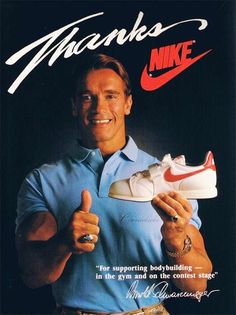 an advertisement for nike shoes with a smiling man holding his shoe in one hand and giving the thumbs up