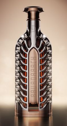 the bottle is made out of metal and has an intricate design