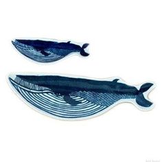 two blue whale stickers sitting next to each other