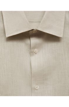 Lightweight and comfortable, this shirt tailored from breathable linen makes an ideal choice for sunny days and looks great whether you wear it tucked or untucked. Front button closure Spread collar Long sleeves with button cuffs 100% linen Dry clean Imported Classic Linen Shirt With Buttons, Summer Formal Linen Shirt, Beige Formal Summer Shirt, Linen Shirt With Spread Collar And Placket, Beige Formal Shirt For Summer, Formal Collared Linen Top, Classic Linen Shirt With Button Cuffs, Formal Short Sleeve Linen Top, Modern Linen Shirt With Spread Collar