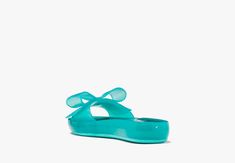 Whether you're lounging by the pool or beach our new slide sandals will keep you looking polished. | Kate Spade Tie The Knot Slide Sandals, Clean Green - 7 Spring Pool Sandals With Synthetic Material, Blue Sandals For Spring Poolside, Blue Sandals For Poolside Spring, Adjustable Sandals For Pool And Spring Season, Slide Jelly Sandals For Beach Season Vacation, Flat Sandals For Summer Poolside, Flat Sandals For Pool And Summer, Slide Sandals For Pool And Beach Season, Adjustable Slide Jelly Sandals For Beach