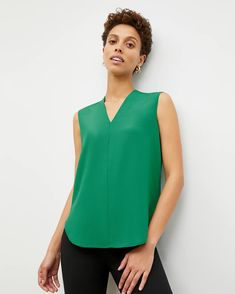 Emmy Top - Eco Soft Wave :: Clover – M.M.LaFleur Modern V-neck Top For Spring, Versatile V-neck Tops For Layering, Casual V-neck Tank Top For Work, Modern V-neck Tops For Summer, Modern Tops With Shirttail Hem For Work, Green Relaxed Fit V-neck Top, Versatile V-neck Blouse In Viscose, Versatile Viscose V-neck Blouse, Modern Relaxed Fit V-neck Top