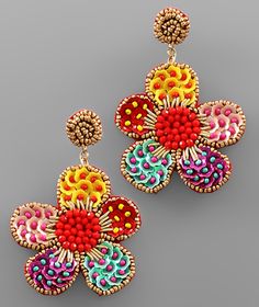 two pairs of colorful flower shaped earrings with beading on the bottom and back side