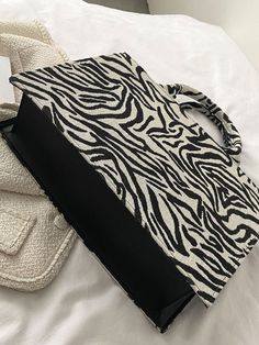 Bag For Love - Zebra Striped Pattern Tote Bag - Women Tote Bags Product Description Style Funky Color Black and White Quantity 1 piece Strap Type Double Handle Pattern Type Zebra Stripe Bag Size Large Type Top Handle Bag Material Linen Composition 60% Linen Composition 40% Polyurethane Size Chart INCH CM Size Bag Width Bag Height Bag Length one-size 4.7 9.8 14.2 Size Bag Width Bag Height Bag Length one-size 12 25 36 Similar Products h2 { text-align: center; } .red-box { width: 100%; display: fle Trendy Black Zebra Print Bags, White Rectangular Bag With Zebra Print, Black Zebra Print Bags For Daily Use, Black Zebra Print Bag For Daily Use, Black Square Canvas Bag For Errands, Everyday Zebra Print Tote Bag, Everyday Use Zebra Print Tote Bag, Everyday Use Zebra Print Shoulder Bag, Everyday Zebra Print Shoulder Bag