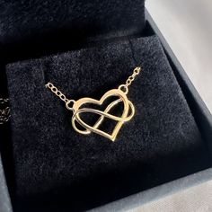 14K Gold Infinity  Heart Pendant Necklace.  The 14K gold heart is wrapped by the  infinity symbol as it goes under and over it creating a united symbol of eternal love. A romantic gift for your loved ones. Necklace Description: * Necklace length (including pendant): 17.5" / 44.5 cm. * Pendant height: 0.629" / 1.6 cm. * Width: 0.472" / 1.2 cm. * Materiel: 14K Gold Stone: Option 1: * Natural diamonds: 34 * TCW: 0.51CT * Color: G-H * Clarity: VS-Si1 Option 2: * CVD diamonds: 34 * TCW: 0.51CT * Colo Gold Infinity Necklace For Anniversary Gift, Gold Infinity Necklace For Anniversary, Infinity-shaped Yellow Gold Jewelry Gift For Her, Infinity Yellow Gold Jewelry Gift For Her, Infinity Yellow Gold Jewelry As A Gift For Her, Yellow Gold Infinity Jewelry As Gift For Her, Gold Infinity Jewelry For Anniversary, Gold Infinity Necklace For Gift, Gold Infinity-shaped Jewelry Gift For Her