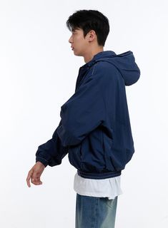 Product Detail Style : Street Occasion : Back to school Type : Men Detail : Stitch, Zip up, Hood Print : Solid Material : Nylon Sleeve : Long sleeve Neck : Hood Fit : Loose fit Nylon100 Color : Blue, Dark red, Black Made in Korea Model Size Model is wearing size M/L and the color Blue. Height : 6'0" | 184cm / Top : L / Bottom : XL (32 inch) .prddescription table, .prddescription td, .prddescription th { border : 1px solid black; border-collapse : collapse; padding: 10px; } Size(Inch) Size Should Casual Long Sleeve Windbreaker With Ribbed Cuffs, Navy Casual Windbreaker For Fall, Casual Hooded Jacket With Ribbed Cuffs For Outdoor, Casual Outerwear With Drawstring Hood, Casual Solid Outerwear With Adjustable Hood, Casual Solid Windbreaker With Drawstring Hood, Navy Windbreaker For Spring Streetwear, Casual Navy Hooded Jacket With Drawstring, Navy Casual Track Jacket With Pockets