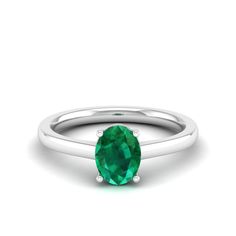 14K White Gold Oval Emerald Ring In 14k White Gold, Classic Oval Cabochon Emerald Ring, Classic Green Emerald Oval Cabochon Ring, Classic Green Oval Cabochon Emerald Ring, Classic 14k White Gold Emerald Ring For May Birthstone, Oval Solitaire Emerald Ring For May Birthstone, Green Emerald Ring In 14k White Gold Round Cut, Oval Emerald Ring With Prong Setting, Oval Green Emerald Ring For May Birthstone