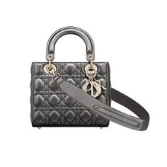 The Lady Dior My ABCDior bag epitomizes the House's vision of elegance and beauty. Sleek and refined, the timeless yet relevant style is crafted in metallic gunmetal calfskin with Cannage stitching, creating the instantly recognizable quilted texture, while the pale gold-finish metal 'D.I.O.R.' charms offer an elegant allure. Featuring a shoulder strap that can be customized by adDiorried by hand, over the shoulder or crossbody. Wide, adjustable and customizable shoulder strap with three pins included. The shoulder strap can accommodate up to six pins in total. Interior zip pocket and patch pocket The bag may be paired with Diorent embroidered straps Dust bag included Made in Italy Delivery 5-8 or 10-15 working days Please note that during high season and Sale period, delivery times may be Lady Dior My Abcdior Bag, Dior And I, Womens Designer Bags, Christian Dior Fashion, Bag Women Fashion, Small Lady, Christian Dior Couture, Dior Fashion, Bag Collection