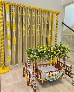 a room decorated with yellow flowers and decorations