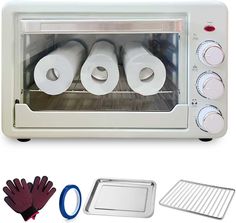 a toaster oven with four rolls of toilet paper in it