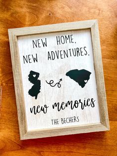 a wooden sign that says new home, new adventures and new memories the bears on it