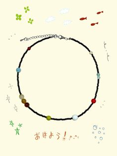 a black beaded necklace with multicolored beads and stars on the bottom is written in chinese