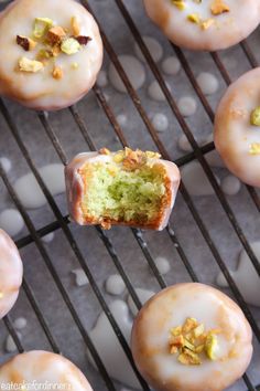 there are many doughnuts that have been cut in half and placed on the grill