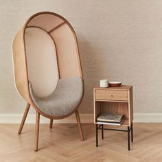 a chair and side table in a room