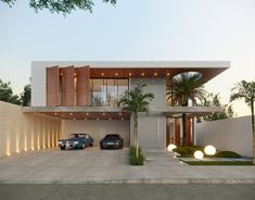 two cars parked in front of a modern house