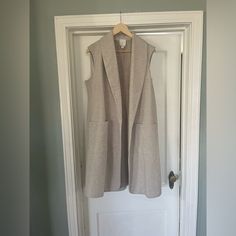 Never Worn Joie Long Vest. 79% Polyester, 11% Acrylic, 10% Viscose Beige Fall Vest For Day Out, Chic Beige Vest For Everyday, Chic Beige Everyday Vest, Chic Everyday Beige Vest, Fall Linen Outerwear For Day Out, Neutral Outerwear For Spring Layering, Spring Layering Neutral Outerwear, Sleeveless Linen Outerwear For Fall, Chic Linen Outerwear For Layering