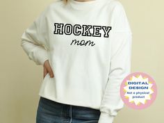 the woman is wearing a hockey mom sweatshirt