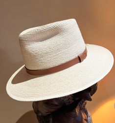 Panama Fine Palm Tear Drop Fedora with a 3 Inch Brim. Did you know that Panama Hats are not made in Panama?  They are hand woven in Guatemala and Ecuador by native craftsmen and the art of fine weaving is passed down the family. Panama Hat - Fine Palm Woven Fedora with a 3 Inch Brim -  10-12 braided fine woven palm strands per inch   -  3" Brim, 5-1/2" crown with Tear drop crease -  5/8" wide leather band in black or brown - Tear Drop shape 2 Available  Sizes:  7  with Black leather band 7-1/8 Natural Woven Western Hat Bands, Artisan Woven Panama Hat With Short Brim, Western Natural Color Woven Hat Bands, Artisan Woven Panama Hat With Flat Brim, Artisan Woven Flat Brim Panama Hat, Western Style Natural Woven Hat Bands, Artisan Woven Fedora Panama Hat, Artisan Handwoven Wide Brim Fedora, Artisan Handwoven Adjustable Fedora