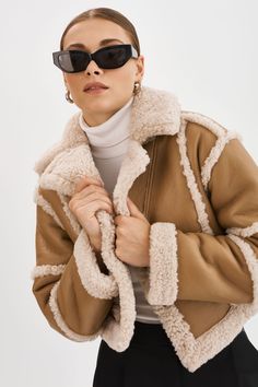 Introducing the Mariane Detachable Faux Shearling Coat, a versatile outerwear piece that offers a range of styling options. With its faux shearling trim and snap button detachable hem at the waist, this coat allows you to switch between a long coat and a cute cropped jacket. Baddie Vibes, Faux Shearling Coat, Faux Shearling Jacket, Coat Trends, Style Box, Fashion Forever, Outer Wear, Shearling Coat, Fur Fashion