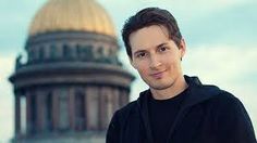 a man standing in front of a domed building