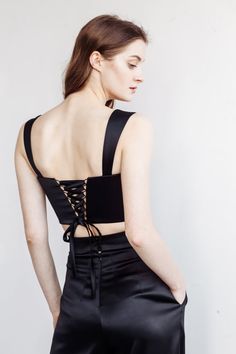 Satin lace-up corset top ANDREA with a square neckline. You can choose corset with lace up or buttons. Just mention this in personalization option. You can wear it with: Oversize jacket: https://www.etsy.com/listing/962180710/jacket-andrea-bridal-suit-city-hall?ga_search_query=jacket&ref=shop_items_search_3&pro=1&frs=1 Palazzo pants: https://www.etsy.com/listing/976154459/satin-pants-andrea-city-hall-wedding?ga_search_query=palazzo&ref=shop_items_search_2&pro=1&frs=1 Crep Bridal Suit, Oversize Jacket, Elegant Suit, Bridal Skirts, Bridal Tops, Crepe Skirts, Bridal Separates, City Hall Wedding, Satin Pants